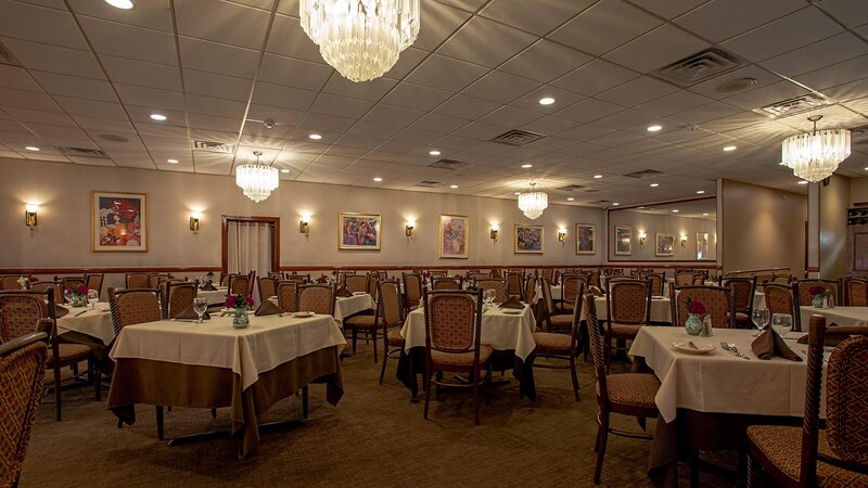 Dining room with many set tables